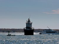 1008280152 ma nb NantucketFerry  The Seastreak Whaling City Express ferry service from New Bedford to Nantucket sails past the Butler Flats light house on its first voyage from New Bedford to Nantucket.   PETER PEREIRA/THE STANDARD-TIMES/SCMG : ferry, waterfront, voyage, trip, harbor